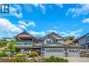 8780 Braeburn Drive, Coldstream, BC  - Outdoor With Balcony With Facade 