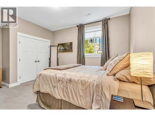 Bedroom on Entry level - 8780 Braeburn Drive, Coldstream, BC - Indoor Photo Showing Bedroom