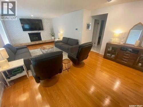 32 Windfield Place, Yorkton, SK - Indoor Photo Showing Living Room With Fireplace