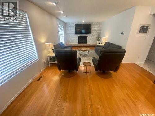 32 Windfield Place, Yorkton, SK - Indoor Photo Showing Living Room With Fireplace