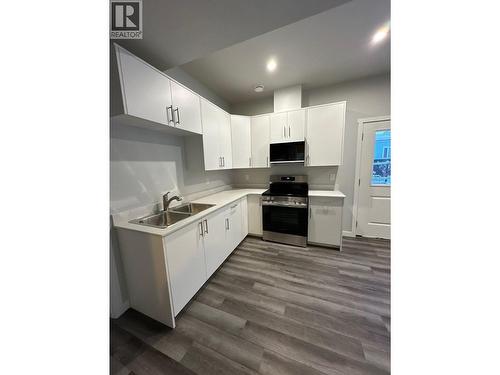 1221 N Blackburn Road, Prince George, BC - Indoor Photo Showing Kitchen With Double Sink