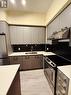 241 - 9471 Yonge Street, Richmond Hill, ON  - Indoor Photo Showing Kitchen With Double Sink 