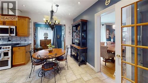 Dining space with a chandelier and recessed lighting - 113 Edmund Road, Kitchener, ON - Indoor