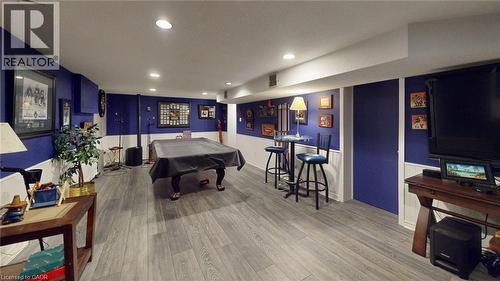 Recreation room featuring billiards table, recessed lighting, wood finished floors, and wainscoting - 113 Edmund Road, Kitchener, ON - Indoor Photo Showing Other Room