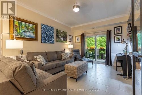 228 - 8111 Forest Glen Drive, Niagara Falls (Mt. Carmel), ON - Indoor Photo Showing Living Room