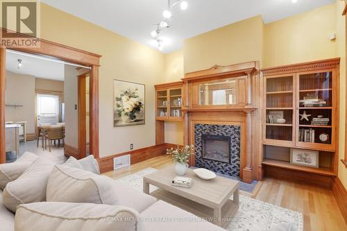 Virtually staged. - 94 Argyle Street N, Renfrew, ON - Indoor Photo Showing Living Room With Fireplace