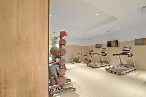 Salle d'exercice - 2310-60 Rue De L'Éclipse, Brossard, QC - Indoor Photo Showing Gym Room