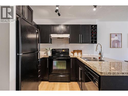 1093 Sunset Drive Unit# 307, Kelowna, BC - Indoor Photo Showing Kitchen With Double Sink