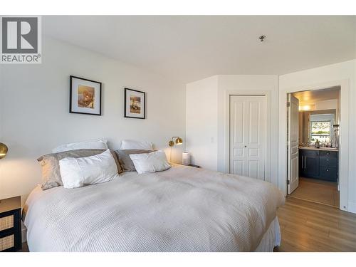 Primary Bedroom - 1093 Sunset Drive Unit# 307, Kelowna, BC - Indoor Photo Showing Bedroom