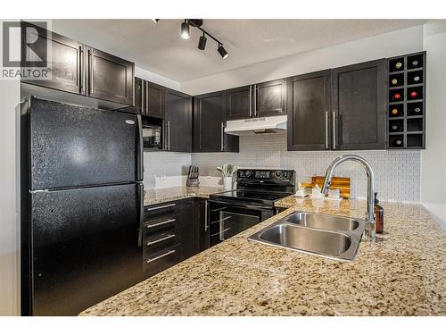 1093 Sunset Drive Unit# 307, Kelowna, BC - Indoor Photo Showing Kitchen With Double Sink