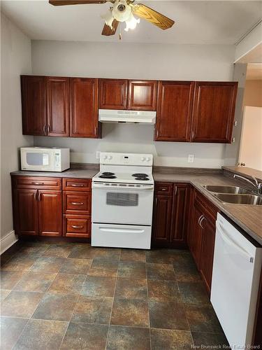 261-263 Lutz St, Moncton, NB - Indoor Photo Showing Kitchen With Double Sink