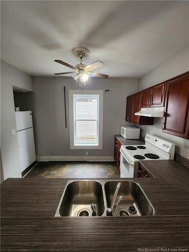 261-263 Lutz St, Moncton, NB - Indoor Photo Showing Kitchen With Double Sink