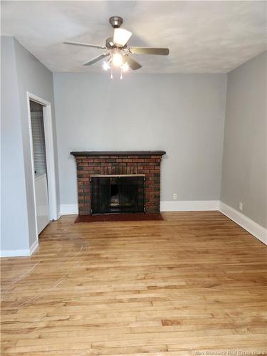 261-263 Lutz St, Moncton, NB - Indoor Photo Showing Living Room With Fireplace