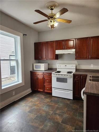 261-263 Lutz St, Moncton, NB - Indoor Photo Showing Kitchen With Double Sink