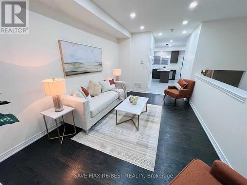 12 Aspen Hill Road, Brampton, ON - Indoor Photo Showing Living Room