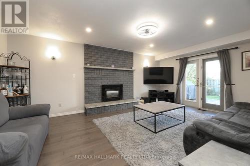 944 William Booth Crescent, Oshawa, ON - Indoor Photo Showing Living Room With Fireplace