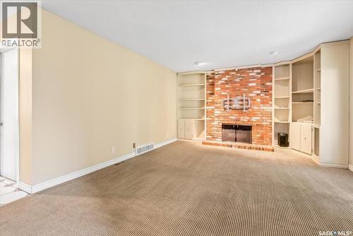 50 Lowry Place, Regina, SK - Indoor With Fireplace