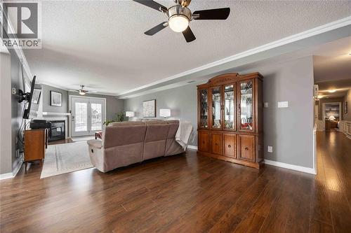 1520 Venetian Boulevard Unit# M101, Point Edward, ON - Indoor Photo Showing Living Room With Fireplace