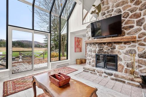 Living room - 40 Rg Des Érables, Brébeuf, QC - Indoor Photo Showing Living Room With Fireplace