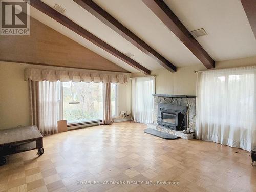 4209 Bath Road, Kingston, ON - Indoor Photo Showing Living Room With Fireplace