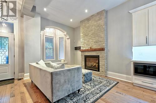 A - 48 Lansdowne Avenue, Toronto, ON - Indoor Photo Showing Other Room With Fireplace