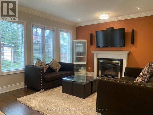201 Bristol Road E, Mississauga, ON - Indoor Photo Showing Living Room With Fireplace