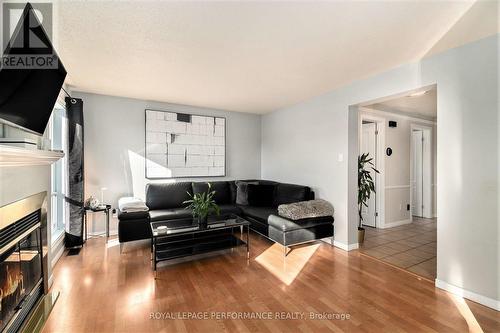 Open to the kitchen - 470 Rougemount Crescent, Ottawa, ON - Indoor Photo Showing Living Room With Fireplace