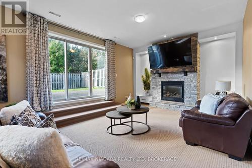 6877 Courtney Crescent, Niagara Falls (Forestview), ON - Indoor Photo Showing Living Room With Fireplace