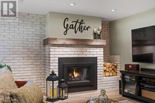 39 Rosemount Avenue, Port Colborne (Sugarloaf), ON - Indoor Photo Showing Living Room With Fireplace