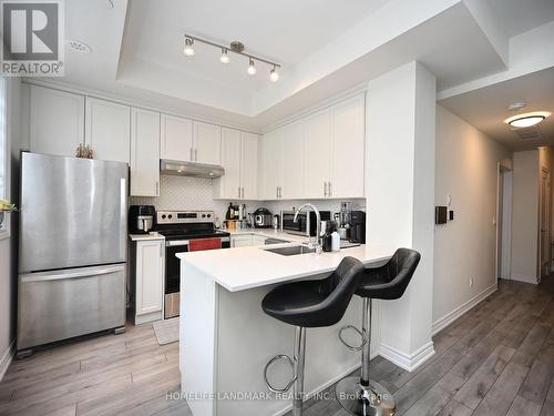 #338 - 349 Wheat Boom Drive, Oakville, ON - Indoor Photo Showing Kitchen With Stainless Steel Kitchen With Upgraded Kitchen
