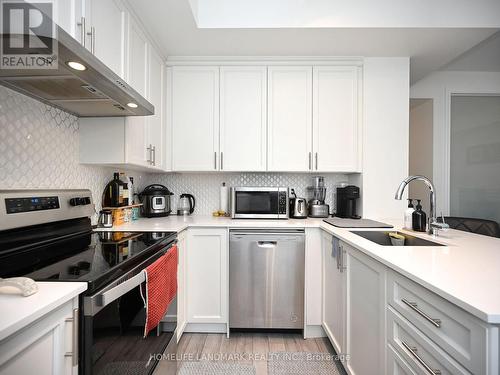 #338 - 349 Wheat Boom Drive, Oakville, ON - Indoor Photo Showing Kitchen With Stainless Steel Kitchen With Upgraded Kitchen