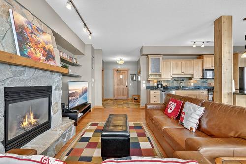 203-315 Whitehorse Lane, Big White, BC - Indoor Photo Showing Living Room With Fireplace