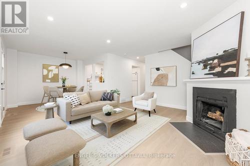 39 Benlark Road, Ottawa, ON - Indoor Photo Showing Living Room With Fireplace