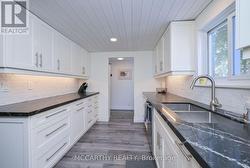 Kitchen walk through to back door - 