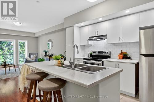 206 - 344 Florence Drive, Peterborough (Monaghan Ward 2), ON - Indoor Photo Showing Kitchen With Double Sink With Upgraded Kitchen