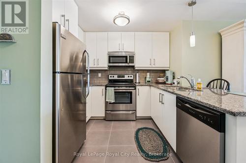 202 - 106 Bard Boulevard, Guelph (Pineridge/Westminster Woods), ON - Indoor Photo Showing Kitchen With Stainless Steel Kitchen With Double Sink