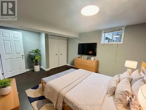 1st virtually staged bedroom - Lower - 140 Monique Crescent, Barrie, ON - Indoor Photo Showing Bedroom