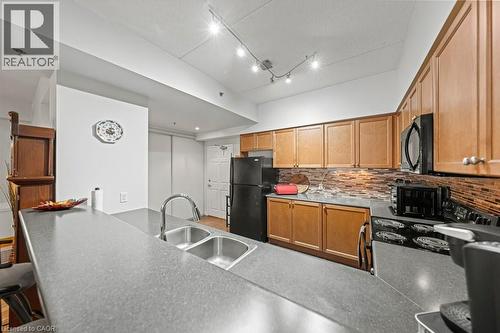 308 Watson Parkway N Unit# 315, Guelph, ON - Indoor Photo Showing Kitchen With Double Sink