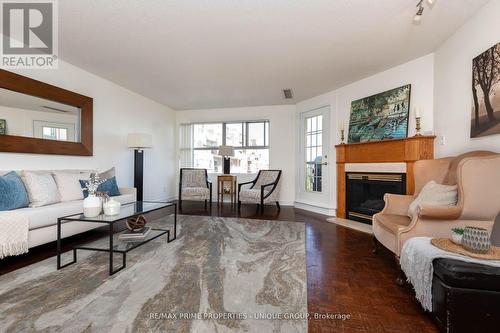 808 - 18 Concorde Place, Toronto, ON - Indoor Photo Showing Living Room With Fireplace