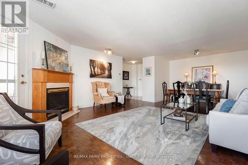 808 - 18 Concorde Place, Toronto, ON - Indoor Photo Showing Living Room With Fireplace
