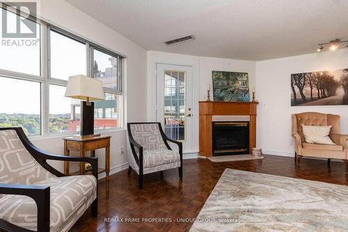 808 - 18 Concorde Place, Toronto, ON - Indoor Photo Showing Living Room With Fireplace
