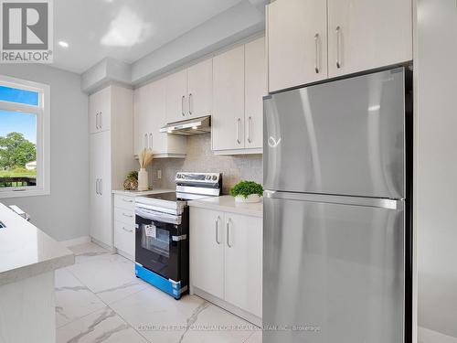 6 - 349 Southdale Road E, London South (South W), ON - Indoor Photo Showing Kitchen
