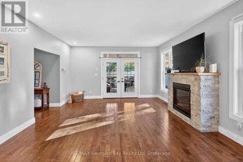 64 Broad Street, Penetanguishene, ON - Indoor Photo Showing Living Room With Fireplace