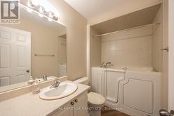 Bath with step-in tub and shower - 