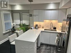 TH99 - 9 WINDERMERE AVENUE  Toronto, ON M6S 5A4