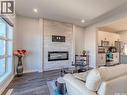 306 Brighton Boulevard, Saskatoon, SK  - Indoor Photo Showing Living Room With Fireplace 