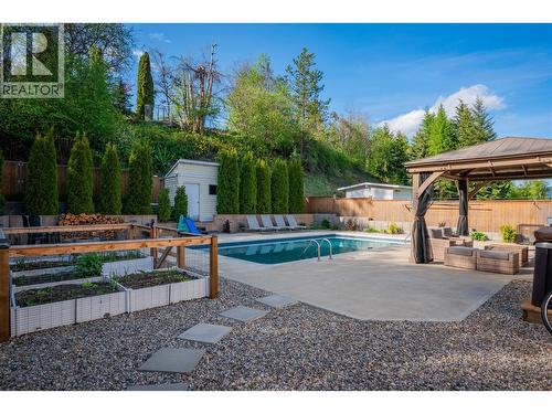 3410 Windsor Place, Castlegar, BC - Outdoor With In Ground Pool With Backyard