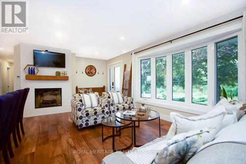 3517 Lockhart Road, Clarington, ON - Indoor Photo Showing Living Room With Fireplace
