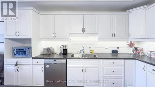 13 - 33 Fairhaven Lane, Goderich (Goderich (Town)), ON - Indoor Photo Showing Kitchen With Double Sink