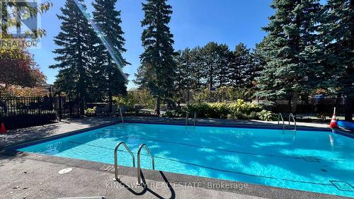 712 - 7420 Bathurst Street, Vaughan, ON - Outdoor With In Ground Pool With Backyard